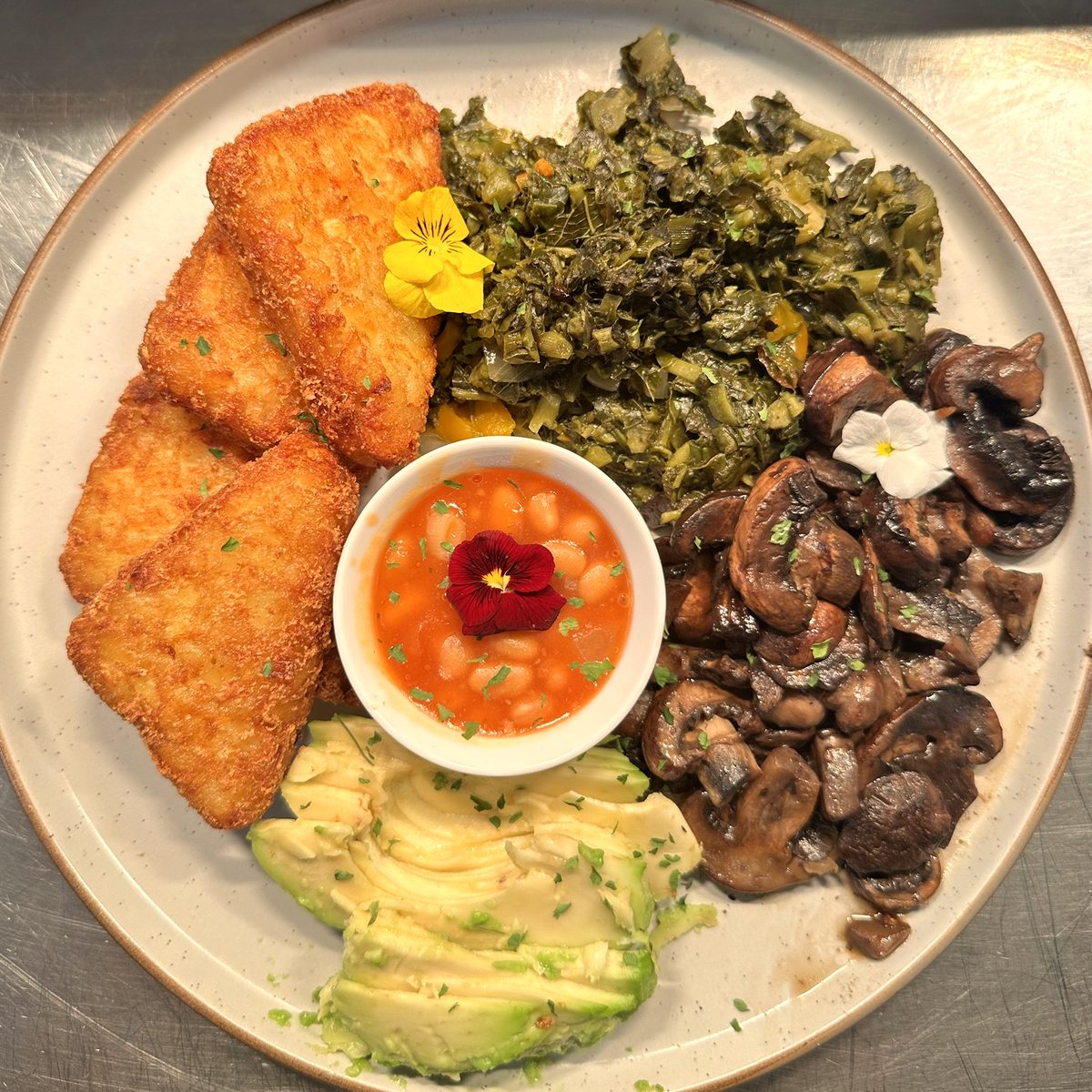 Brockwell Bowl: hash browns, callaloo, mushrooms, beans and avocado